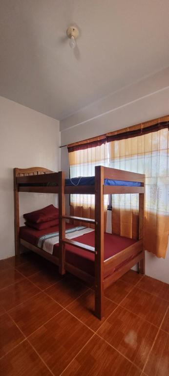 Postel nebo postele na pokoji v ubytování La Vida Hostel