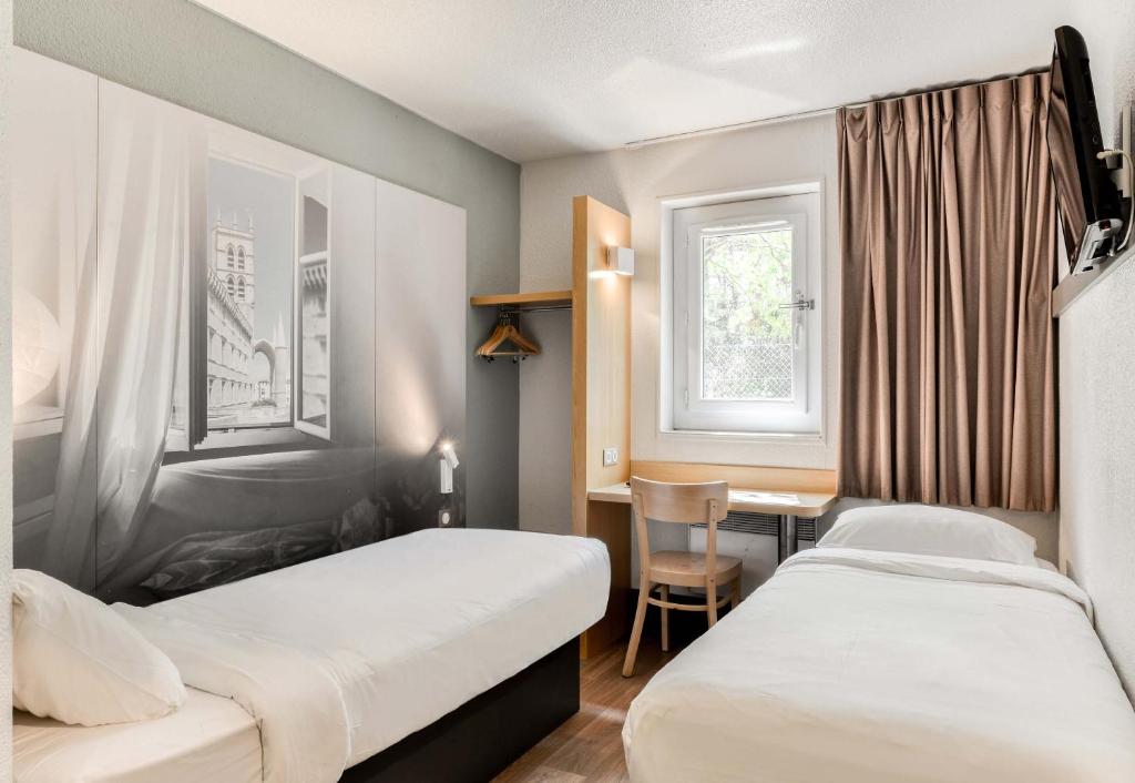 Postel nebo postele na pokoji v ubytování B&B HOTEL Montpellier 1