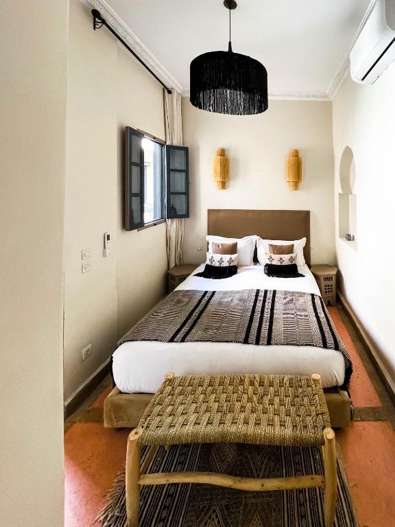 Postel nebo postele na pokoji v ubytování Riad Jonan & Spa