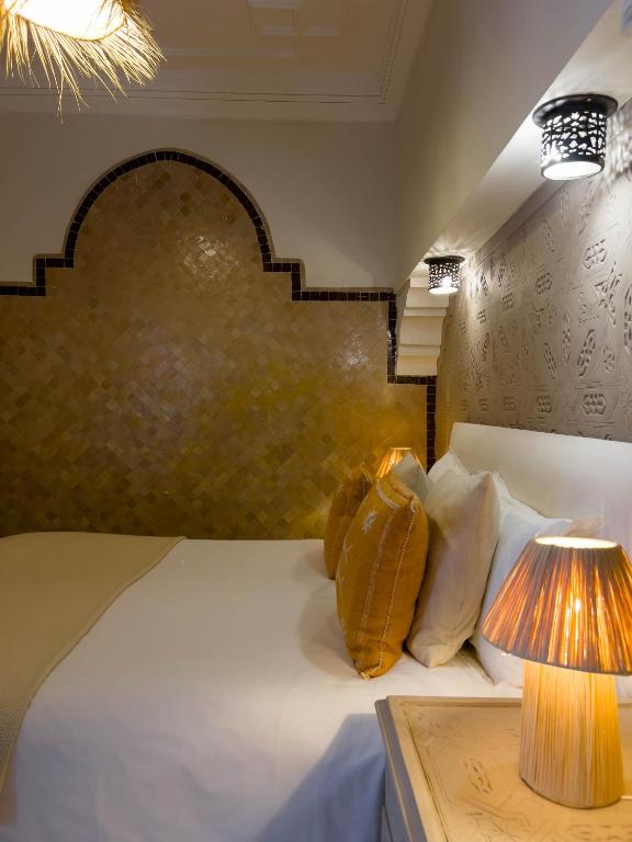 Postel nebo postele na pokoji v ubytování Riad Jonan & Spa
