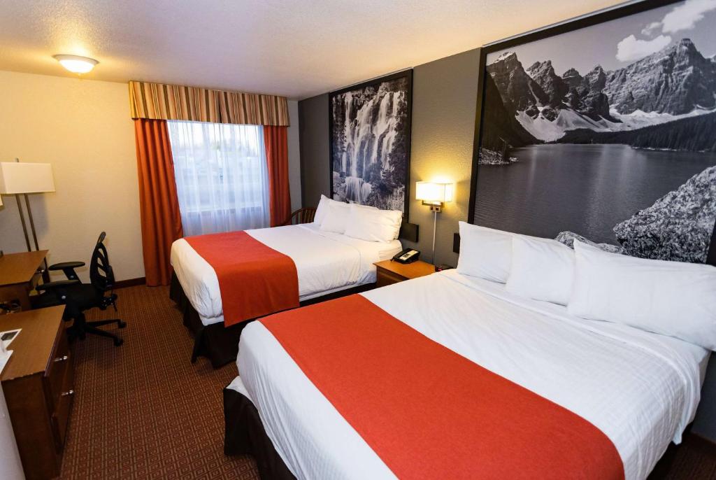 Postel nebo postele na pokoji v ubytování Super 8 by Wyndham Drayton Valley