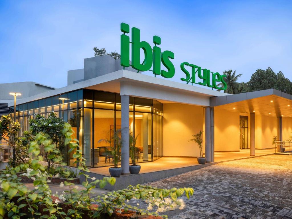 a building with a sign that reads jobs shop at ibis Styles Goa Vagator - An Accor Brand in Vagator