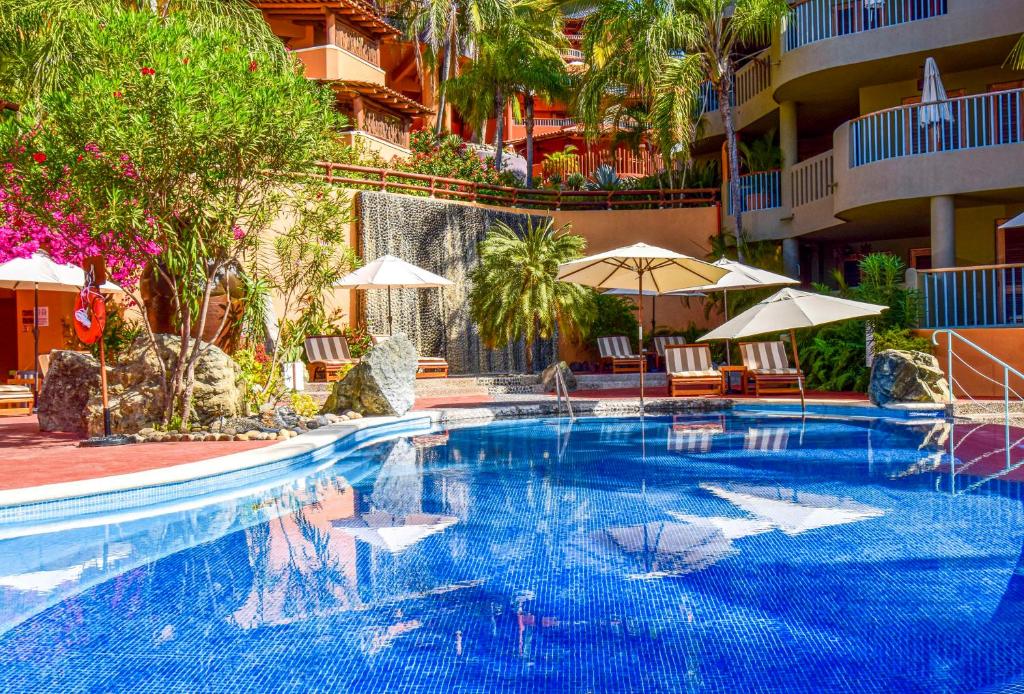 Бассейн в Hilton Grand Vacations Club Zihuatanejo или поблизости