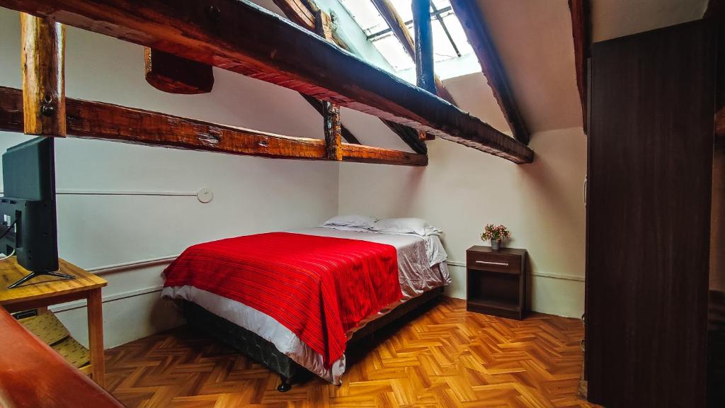 Postel nebo postele na pokoji v ubytování La Casa de Laura - Plaza