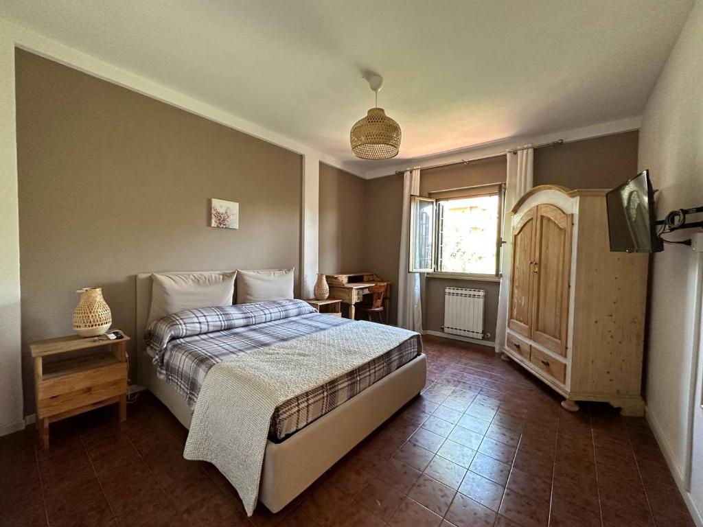 Una cama o camas en una habitación de Villino Felix