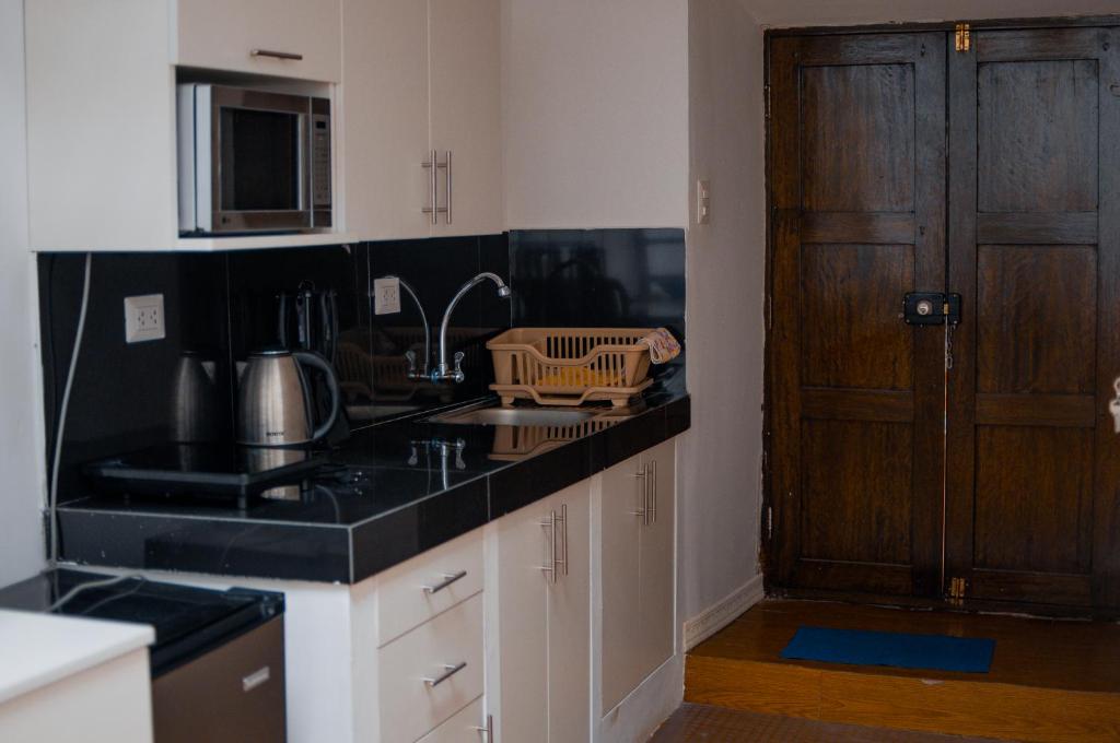 Kuchyň nebo kuchyňský kout v ubytování La Casa de Laura - Plaza