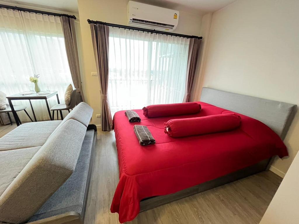 Postel nebo postele na pokoji v ubytování Sweet Dream at D Condo rin Central Fastival Chiang Mai