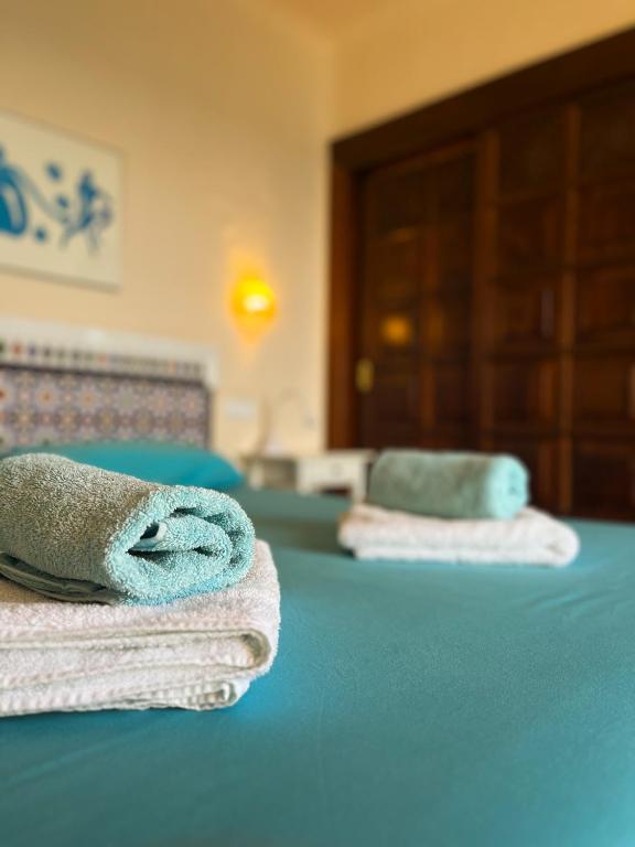 A bed or beds in a room at Beautiful Apartment Altamar