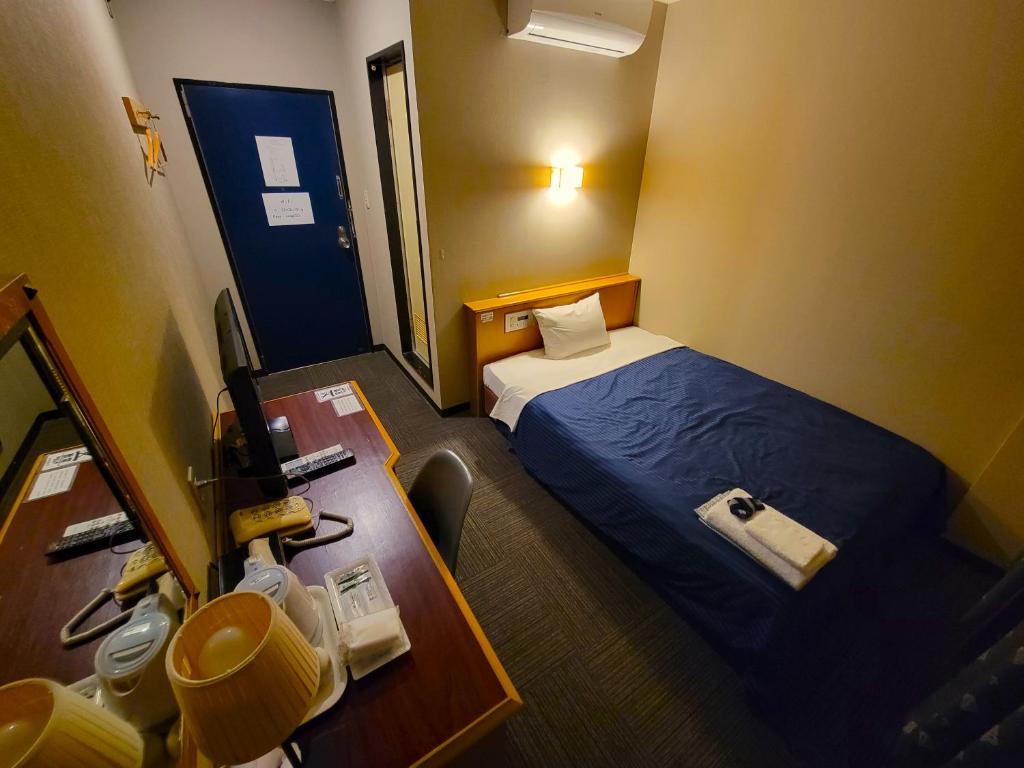 Postel nebo postele na pokoji v ubytování Hotel Seagull