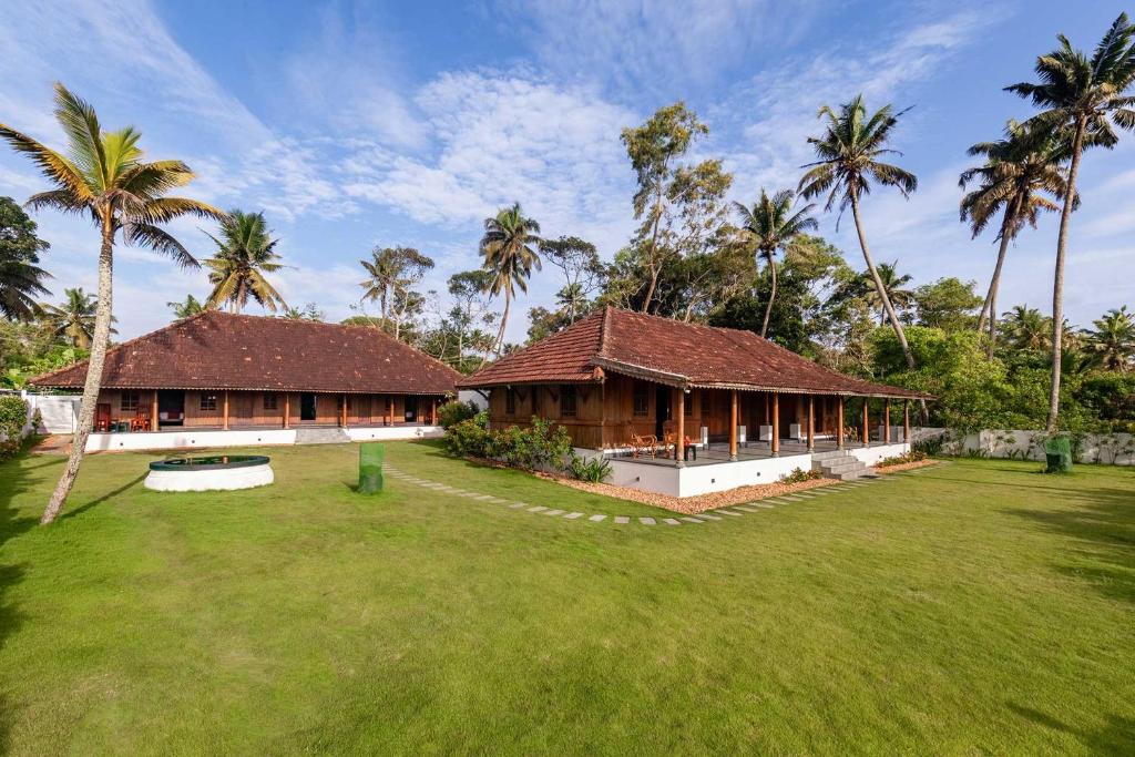 Zahrada ubytování Deshadan's Tarangi Beach Villas,Marari