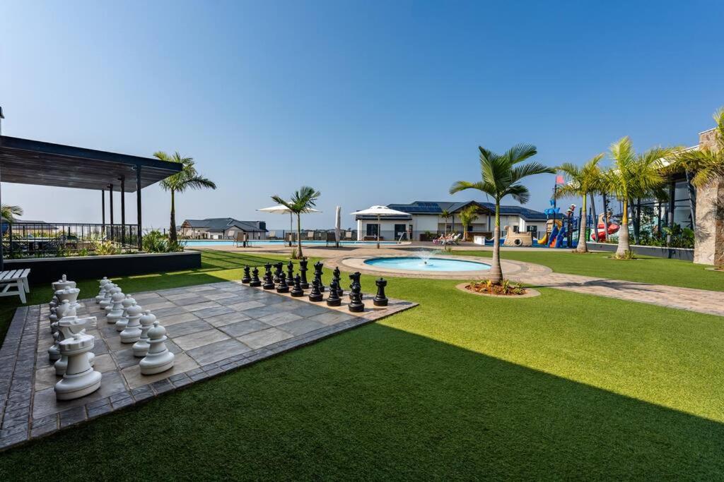 a large chess board in the middle of a park at 864 Ballito Hillis Luxury Estate Family Apartment in Ballito