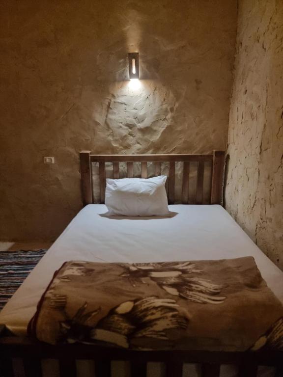 Postel nebo postele na pokoji v ubytování Olive Garden House Siwa