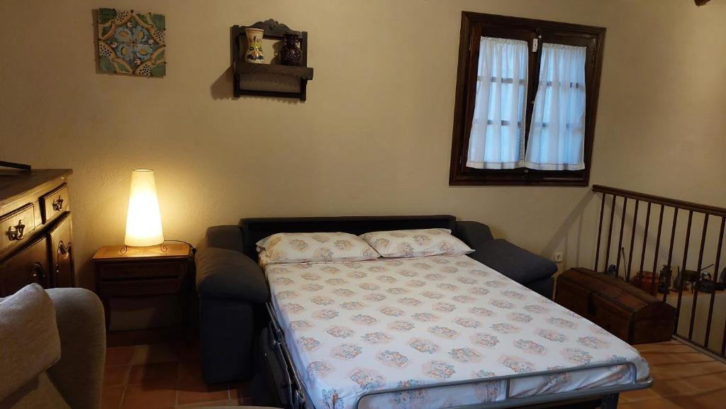 Cama o camas de una habitación en La Calma Montblanc Prenafeta