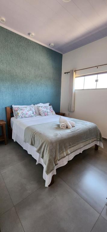 Postel nebo postele na pokoji v ubytování Casa Ypê - Vila de São Jorge