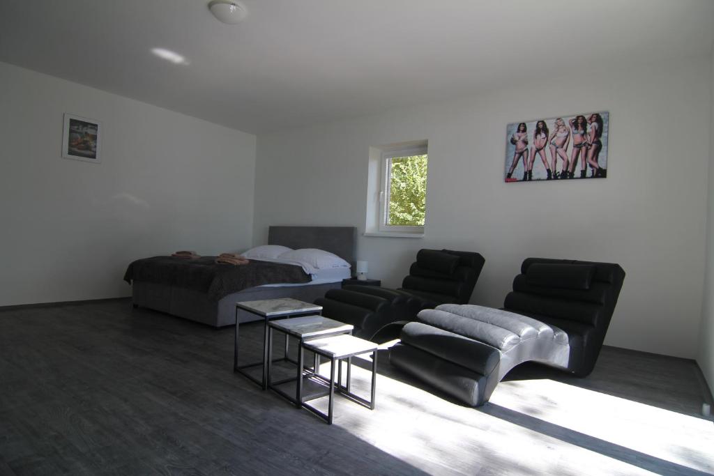 Posezení v ubytování Trdlovy Apartmány a Chata Tatranec v areálu Jaškovské krčmy