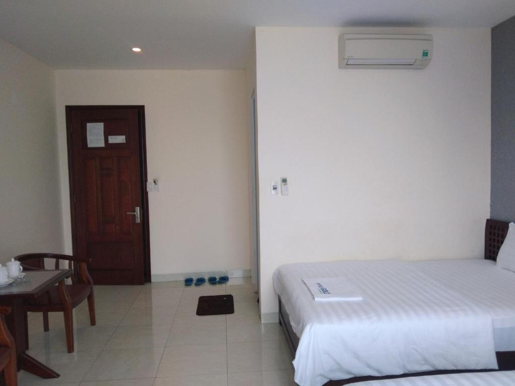 Postel nebo postele na pokoji v ubytování GOLD Hotel