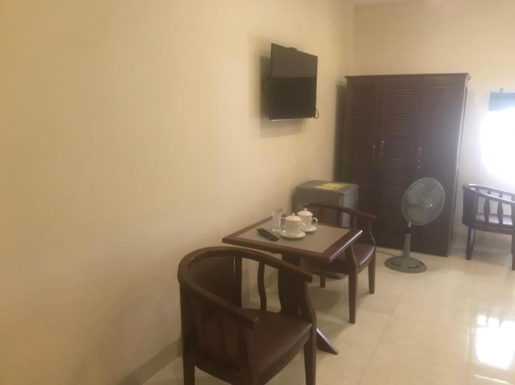 TV a/nebo společenská místnost v ubytování GOLD Hotel