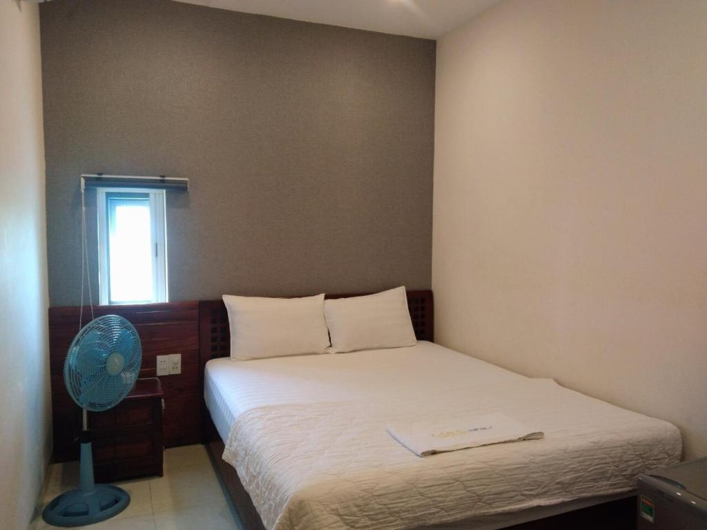 Postel nebo postele na pokoji v ubytování GOLD Hotel