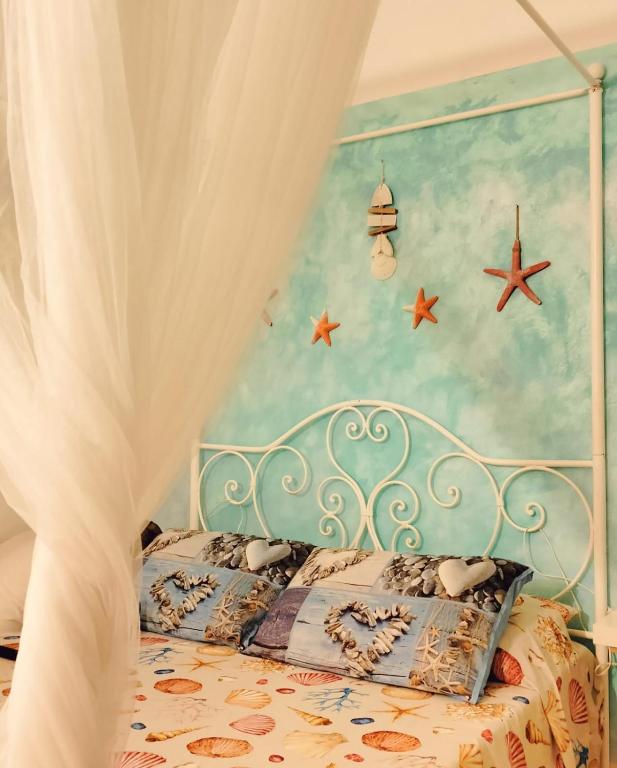 Postel nebo postele na pokoji v ubytování B&B La Casa in Centro