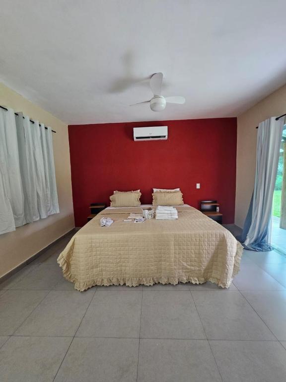 Uma cama ou camas num quarto em Hotel Pousada Bambuzal