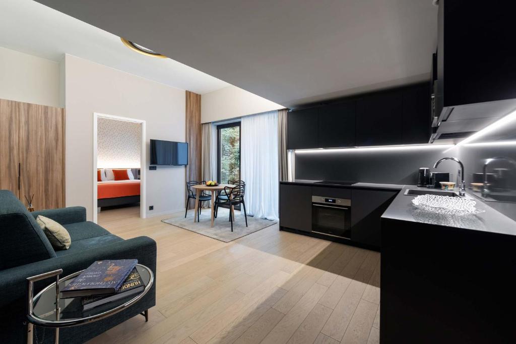 Kuchyň nebo kuchyňský kout v ubytování The Central Kirchberg - Smart ApartHotel