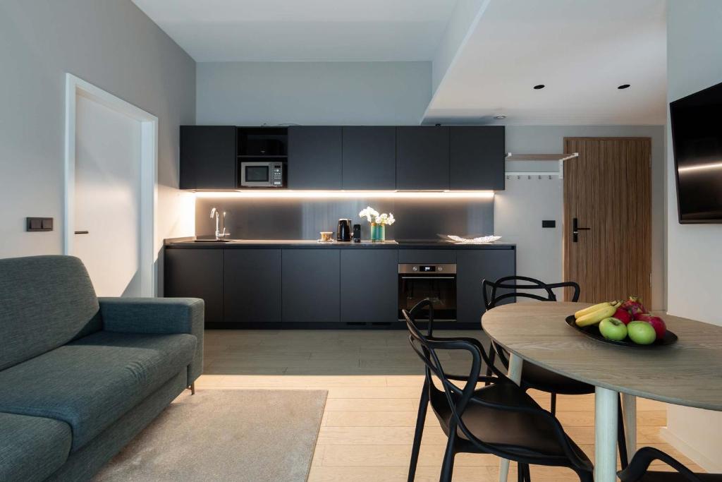 Kuchyň nebo kuchyňský kout v ubytování The Central Kirchberg - Smart ApartHotel