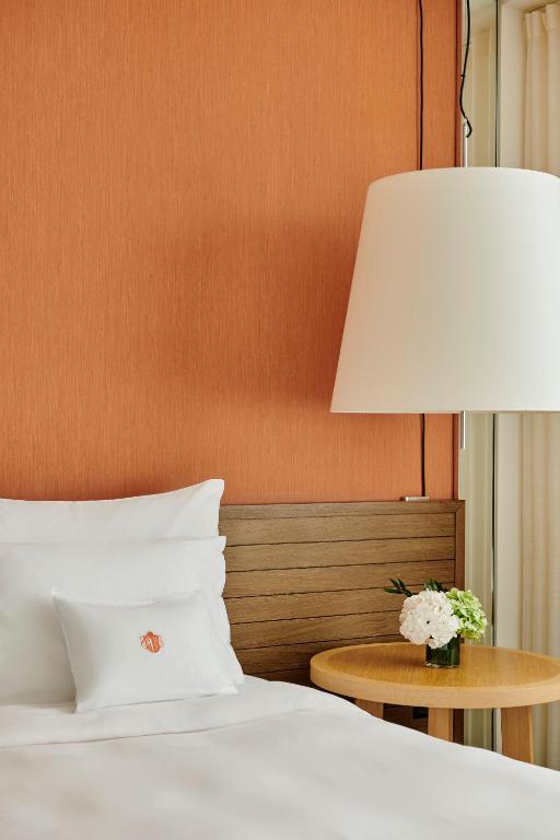 Ένα ή περισσότερα κρεβάτια σε δωμάτιο στο InterContinental Genève by IHG