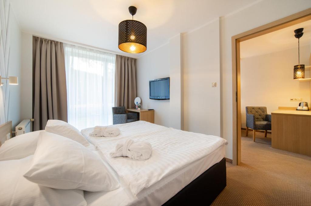 Posteľ alebo postele v izbe v ubytovaní Marena Wellness & Spa