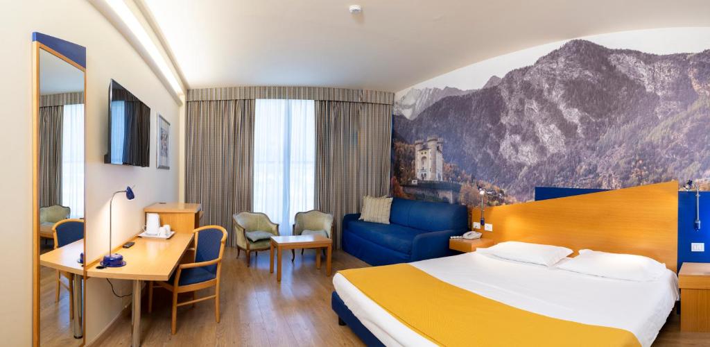 Postel nebo postele na pokoji v ubytování Hotel Express Aosta East