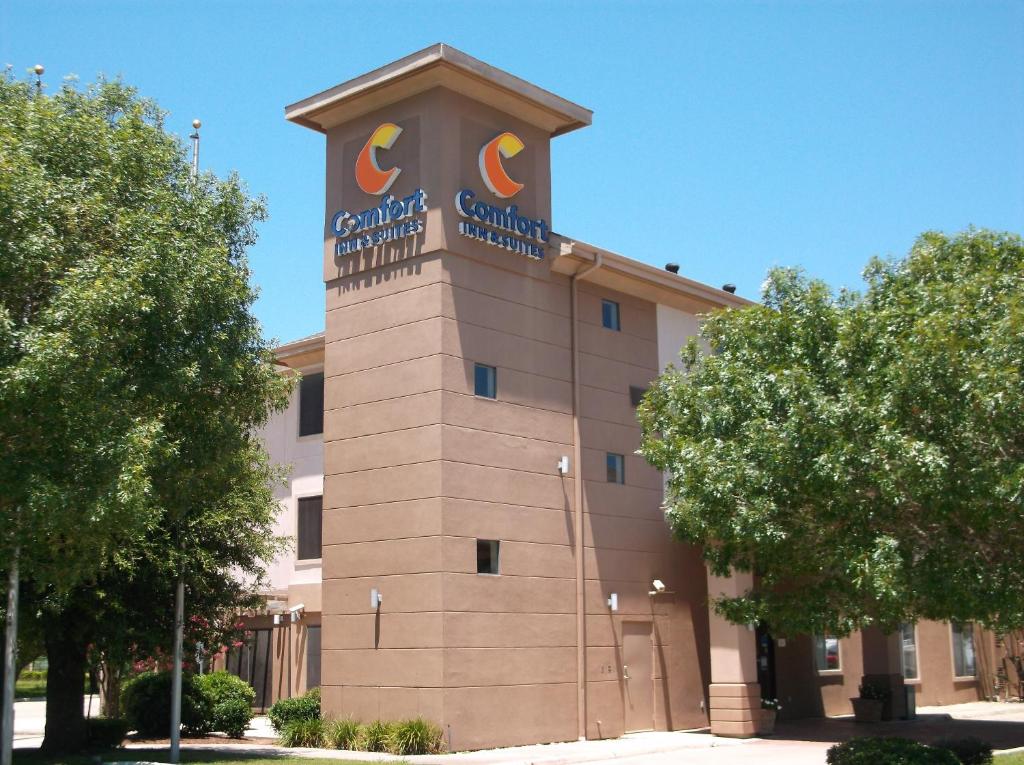 a building with a clock tower on top of it at Comfort Inn & Suites in Seguin