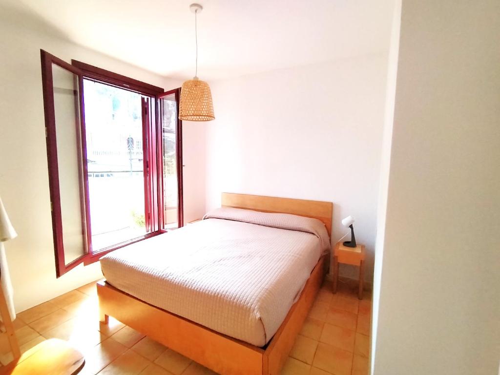 Postel nebo postele na pokoji v ubytování Villa Ghezzi Sea View