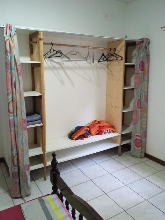 Postel nebo postele na pokoji v ubytování MO TI KOTÉ