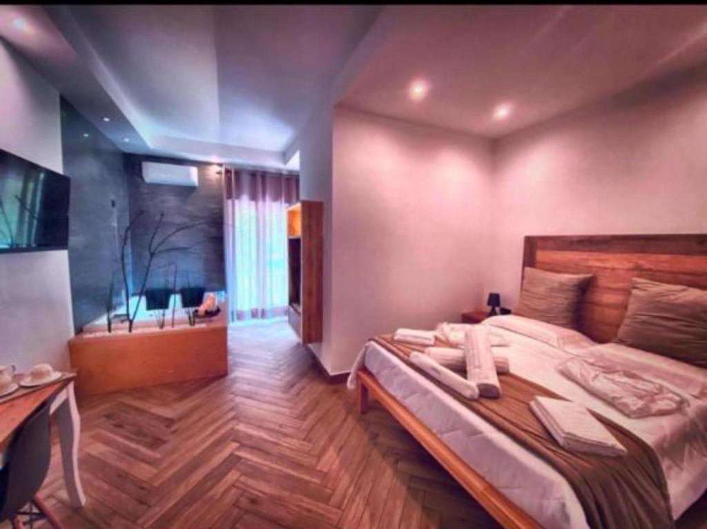 Postel nebo postele na pokoji v ubytování Suite Pizzo jacuzzi rooms