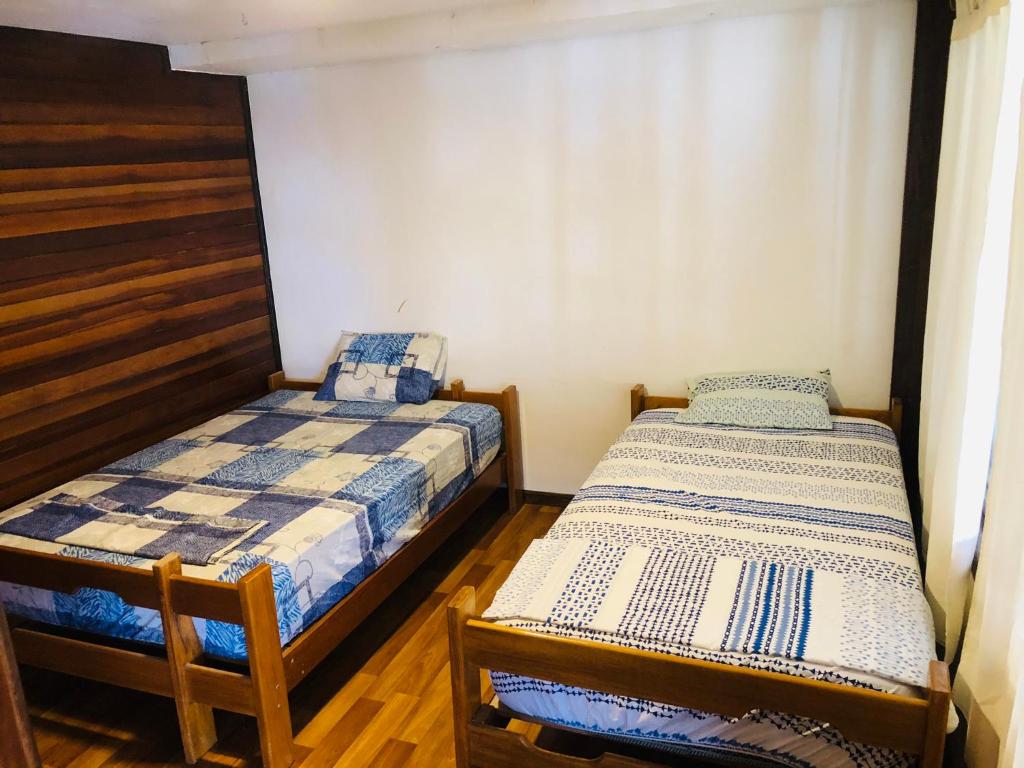 Postel nebo postele na pokoji v ubytování Casa Lobos