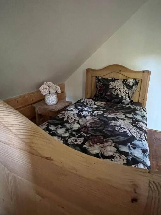 Postel nebo postele na pokoji v ubytování Chalupa Záskalí