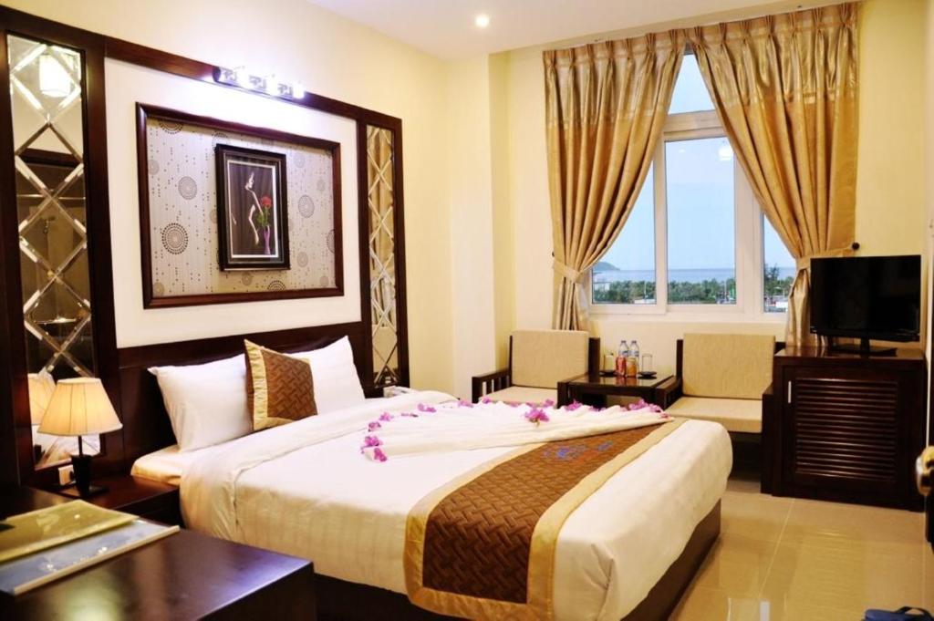 Letto o letti in una camera di Sunview Beach Hotel Danang