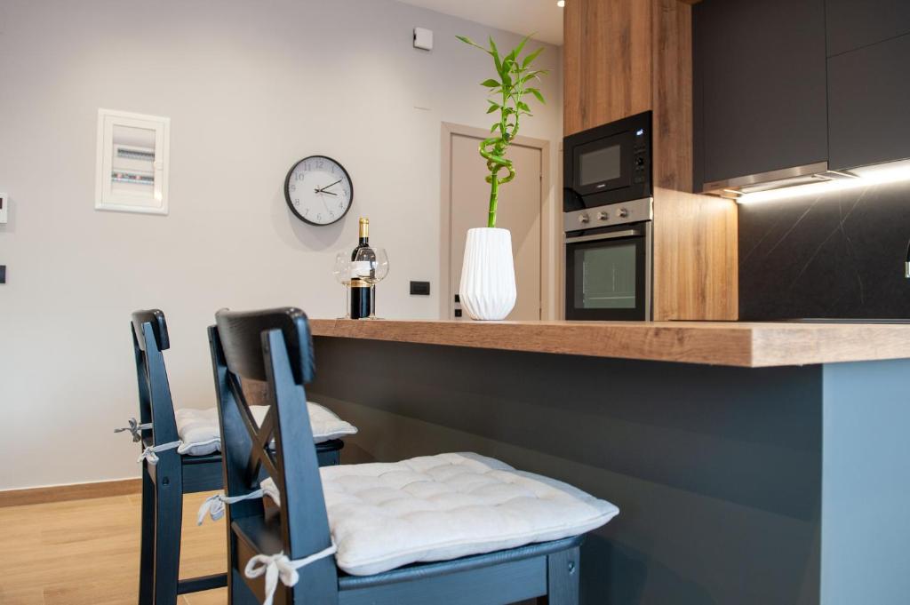 A kitchen or kitchenette at Lovely Guesthouse - 58m2 mountain view