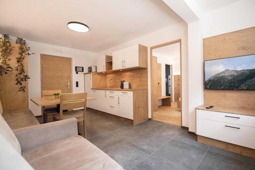Kuchyň nebo kuchyňský kout v ubytování Living Miramor
