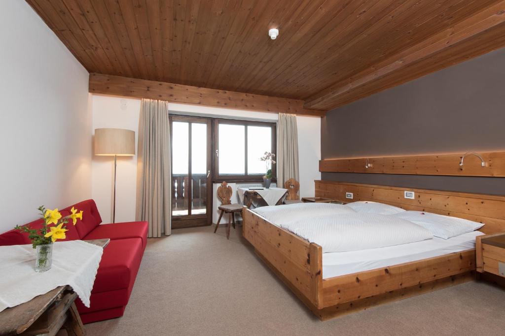 Postel nebo postele na pokoji v ubytování Hotel Ansitz Kematen ***S