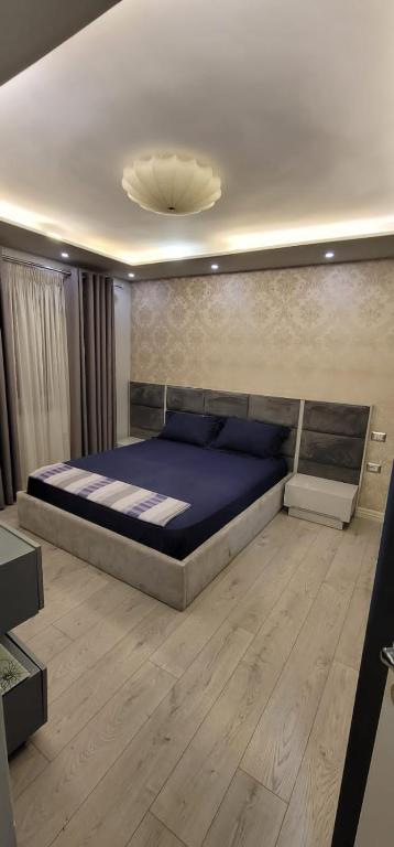 Postel nebo postele na pokoji v ubytování New Bazar Luxury Apartment