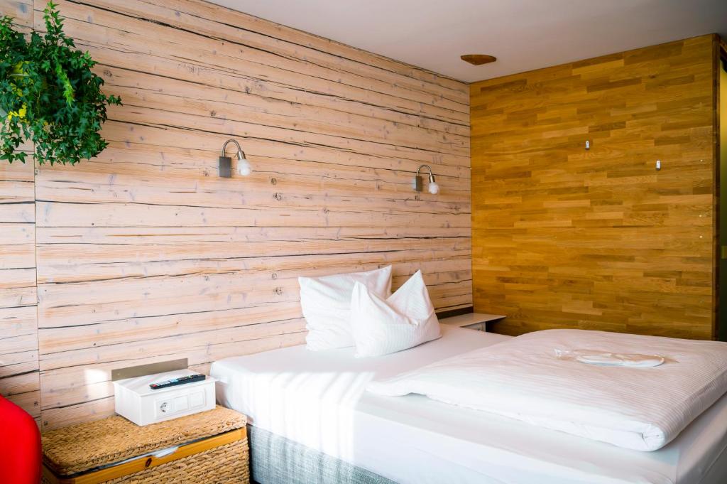 Postel nebo postele na pokoji v ubytování Abalon Hotel ideal