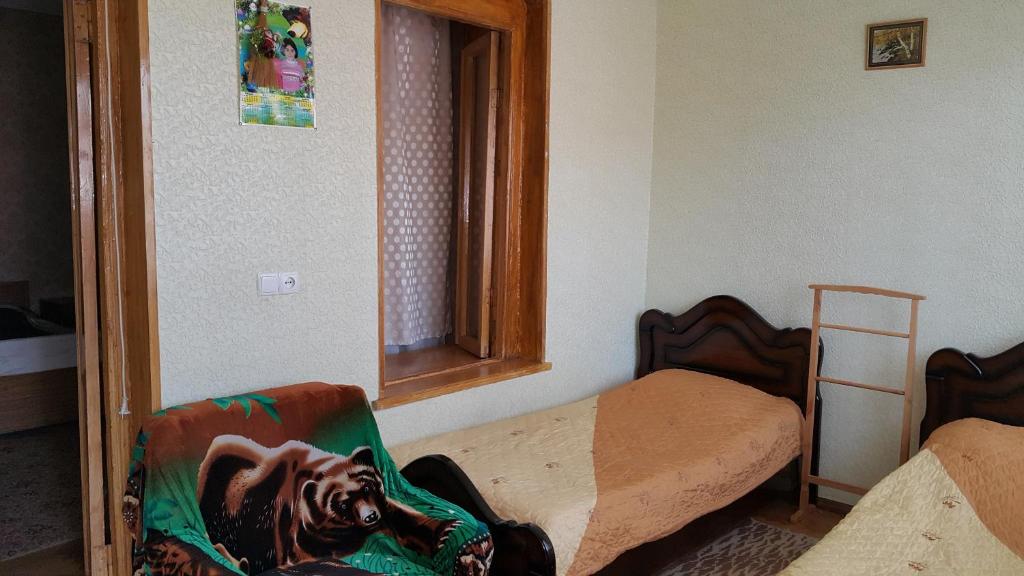 Postel nebo postele na pokoji v ubytování Guest House Wine