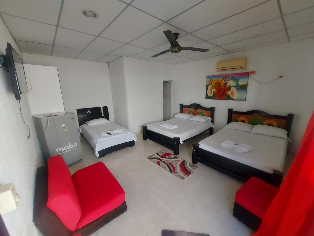 Postel nebo postele na pokoji v ubytování Hotel Campestre Diamante Real