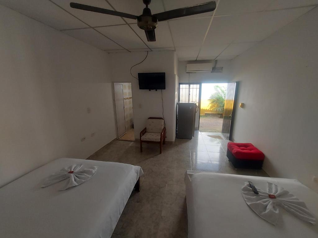 Postel nebo postele na pokoji v ubytování Hotel Campestre Diamante Real