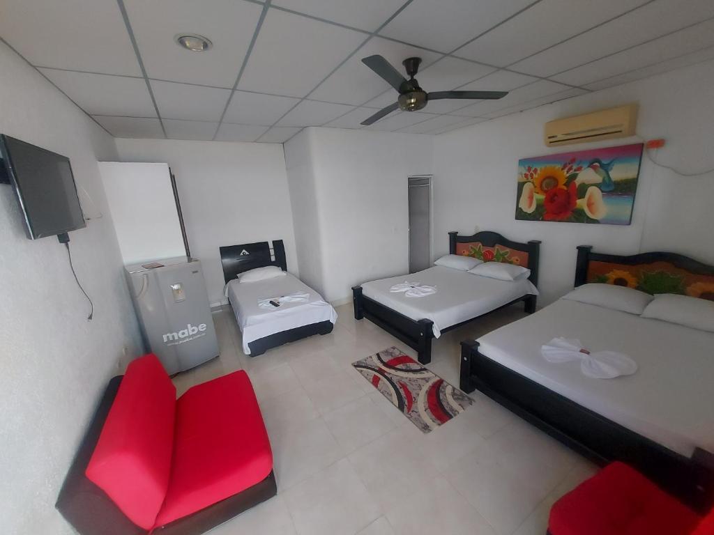 Postel nebo postele na pokoji v ubytování Hotel Campestre Diamante Real