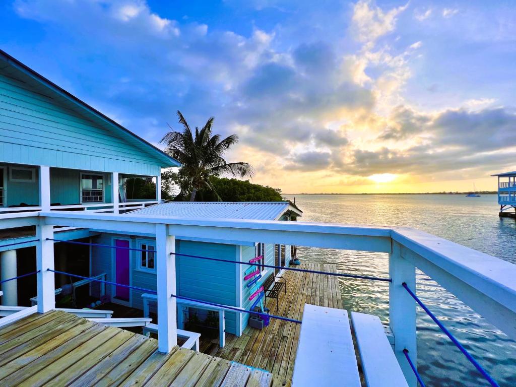 a house on a dock on the water at Dockside Utila Ocean front suites in Utila