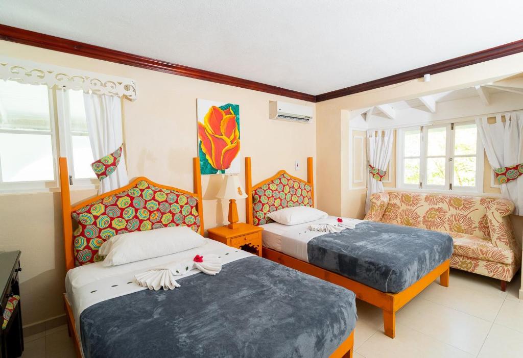 Voodi või voodid majutusasutuse Franklyn D Resort & Spa All Inclusive toas