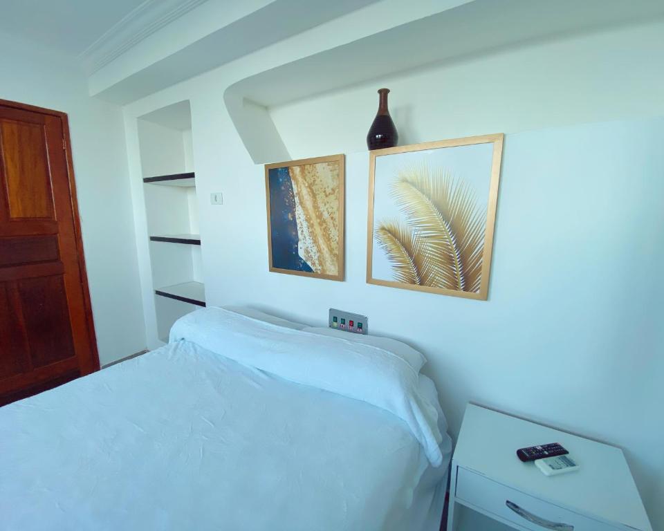 Cama ou camas em um quarto em Hotel 5 Sóis