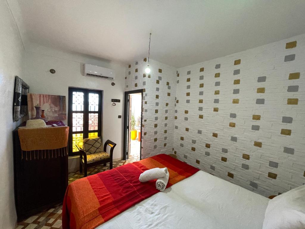 Postel nebo postele na pokoji v ubytování Sun Hostel