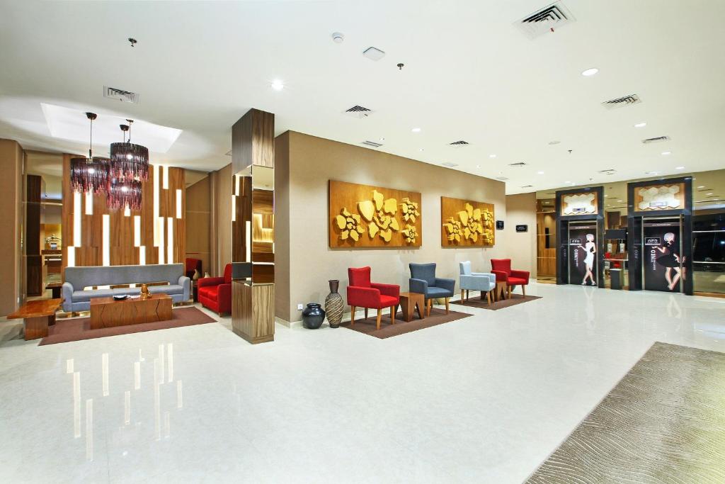 Posezení v ubytování Hotel NEO Cirebon by ASTON